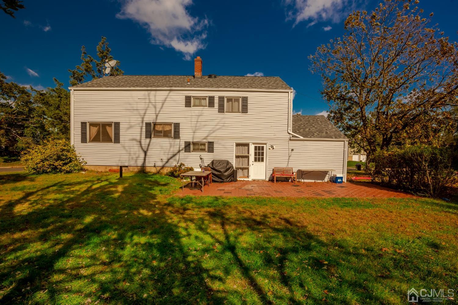28 Atlantic Road Somerset, NJ 08873 - Photo 16 of 18 a view of a house with a backyard