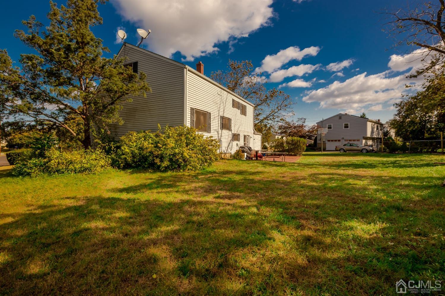 28 Atlantic Road Somerset, NJ 08873 - Photo 18 of 18 a view of a house with a big yard