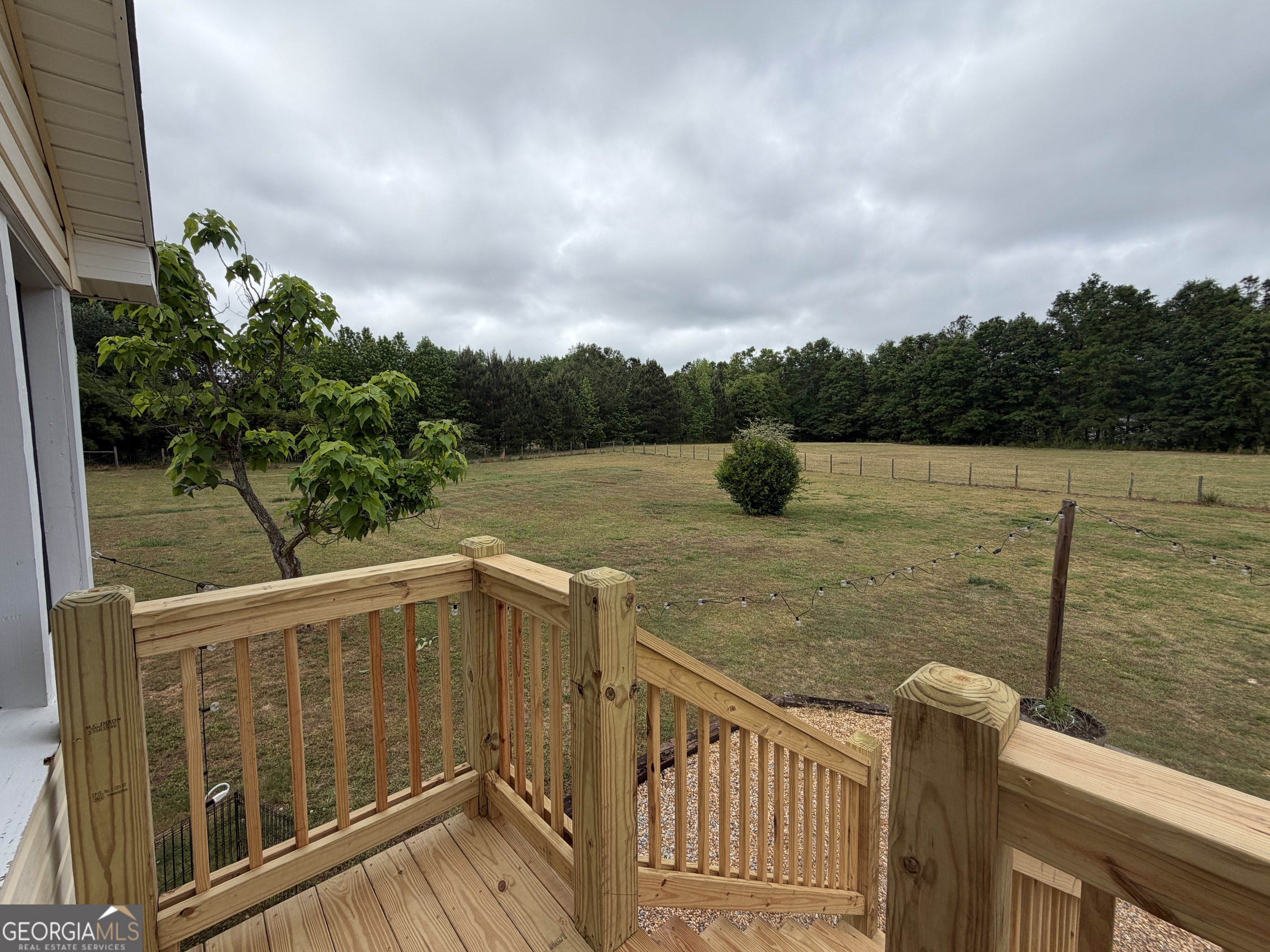 1410 Greensboro Road Madison, GA 30650 - Photo 6 of 17 a view of a lake from a balcony