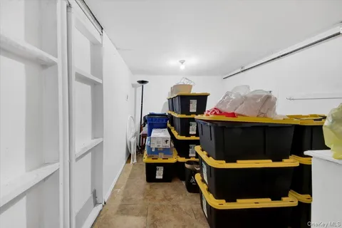 a room with furniture and a flat screen tv