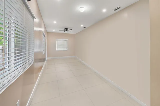 a view of hallway with a window