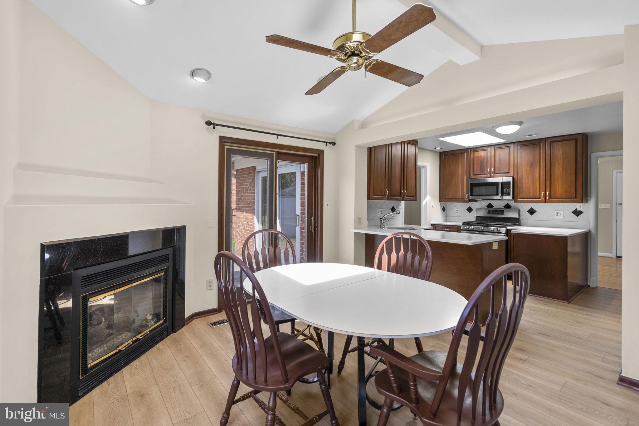 5108 Viking Road Bethesda, MD 20814 - Photo 19 of 51 a view of a dining room with furniture window and wooden floor