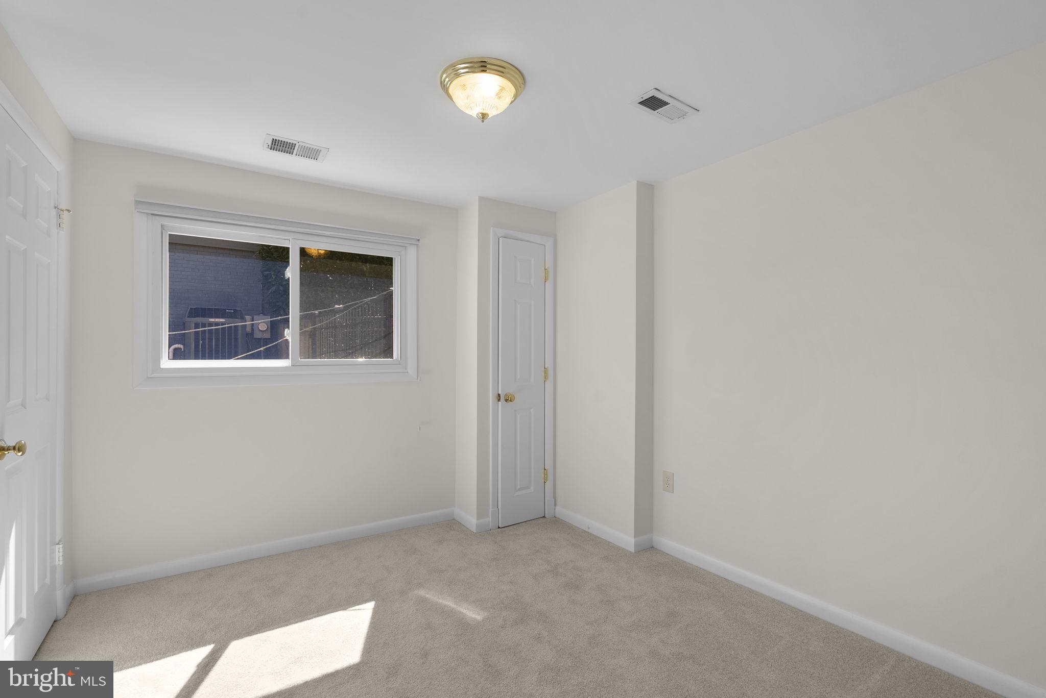 5108 Viking Road Bethesda, MD 20814 - Photo 38 of 51 a view of an empty room with a window