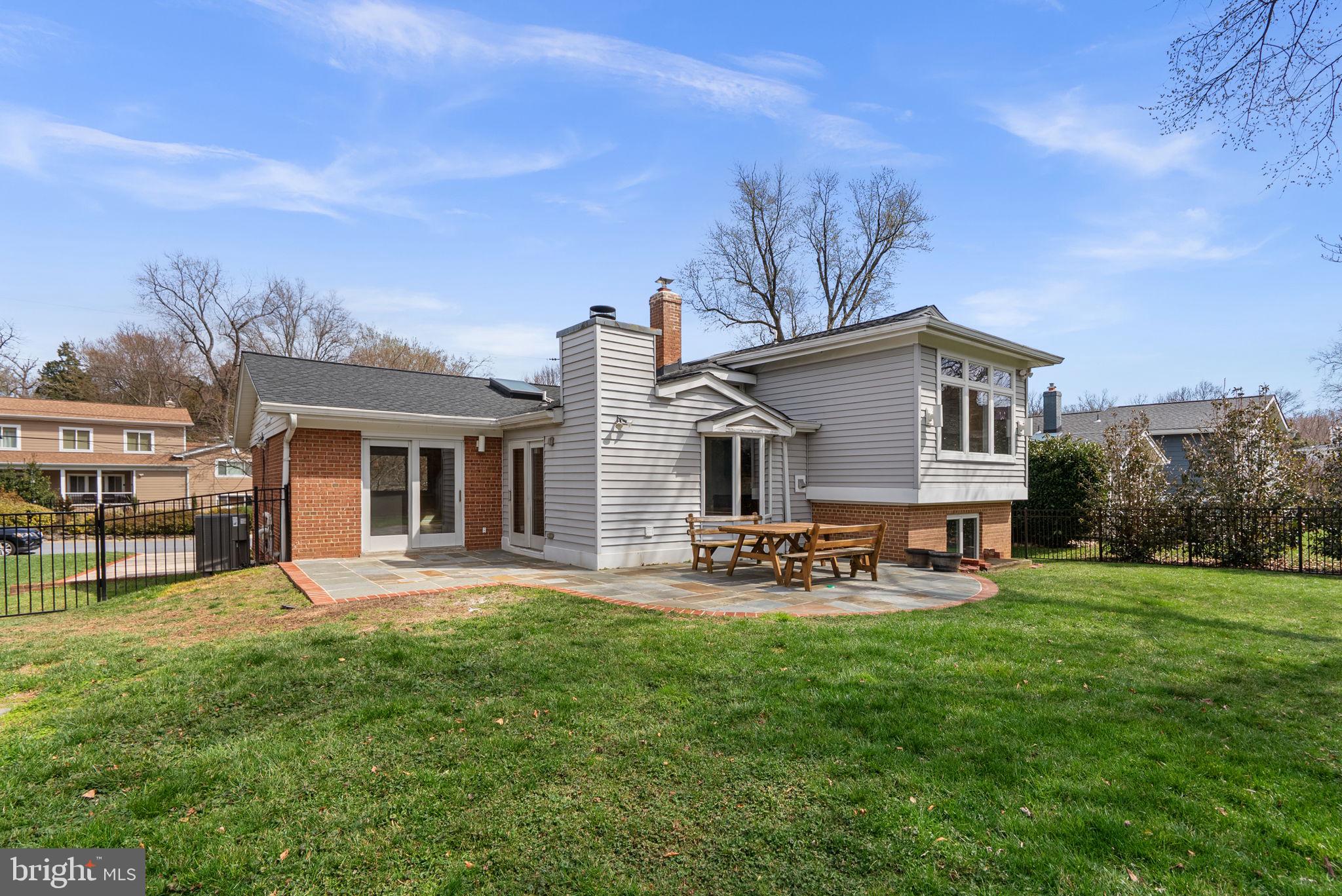 5108 Viking Road Bethesda, MD 20814 - Photo 47 of 51 a view of a house with patio and a yard