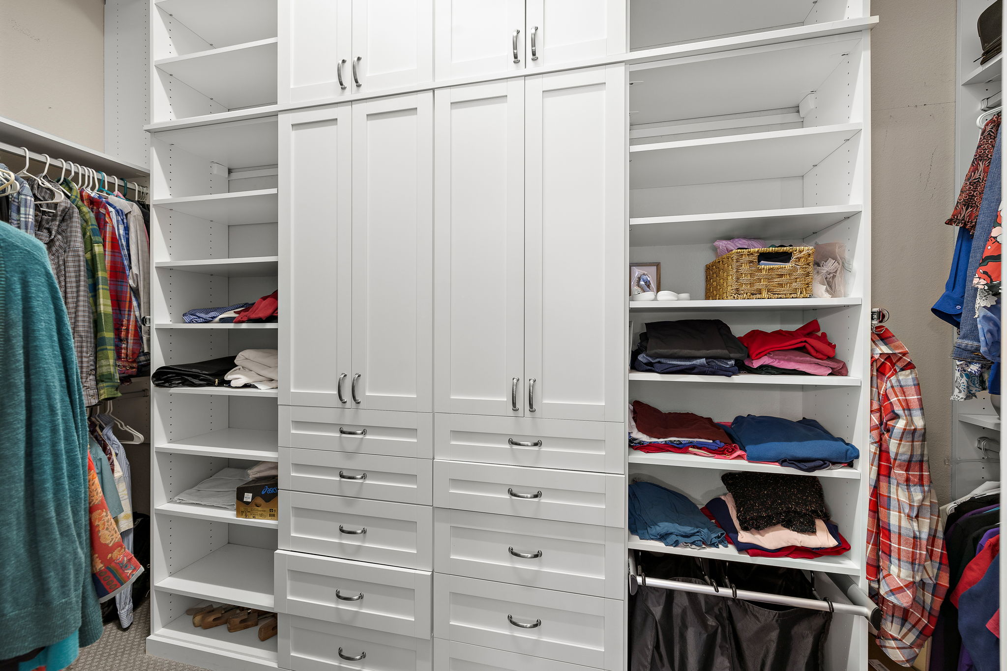 5016 Yucca Flower Lane Georgetown, TX 78626 - Photo 19 of 31 a view of walk in closet with clothes and shoes