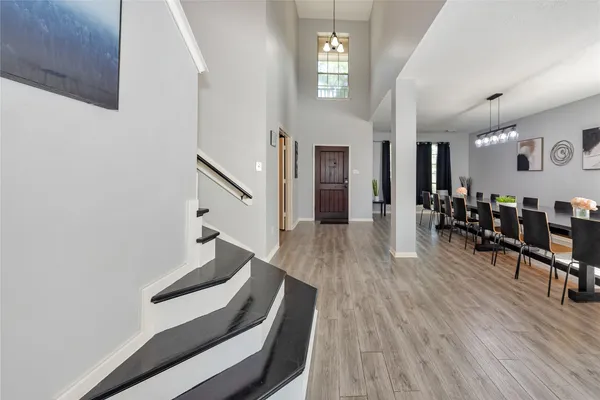 wooden floor with an entryway