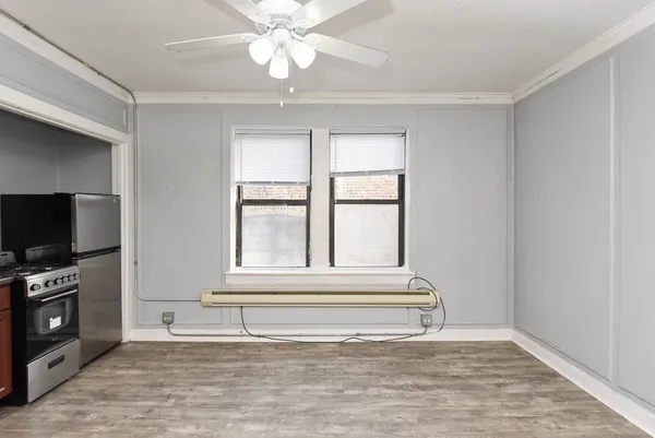 a view of livingroom with furniture wooden floor and window