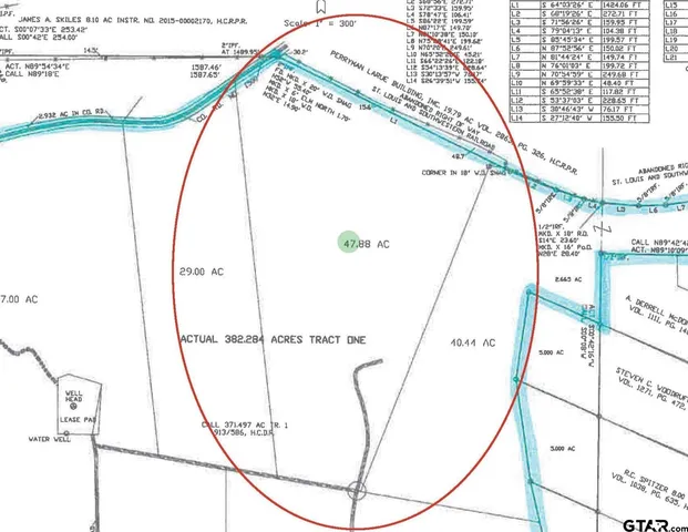 a picture of a bathroom with a shower and a mirror