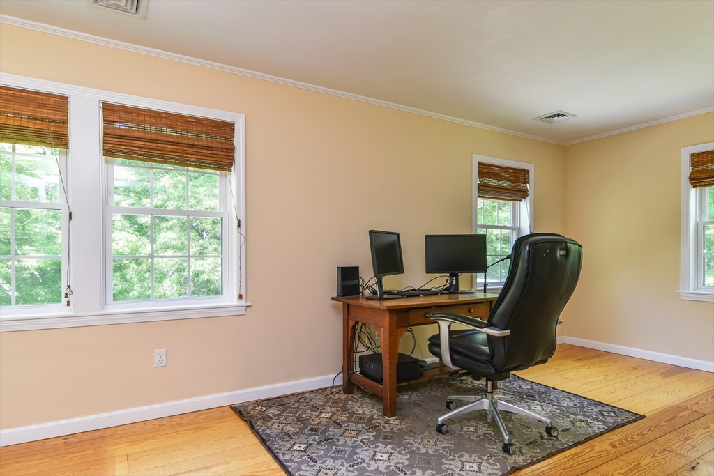 33 Grove Street Framingham, MA 01701 - Photo 21 of 33 a view of a workspace with furniture and a window