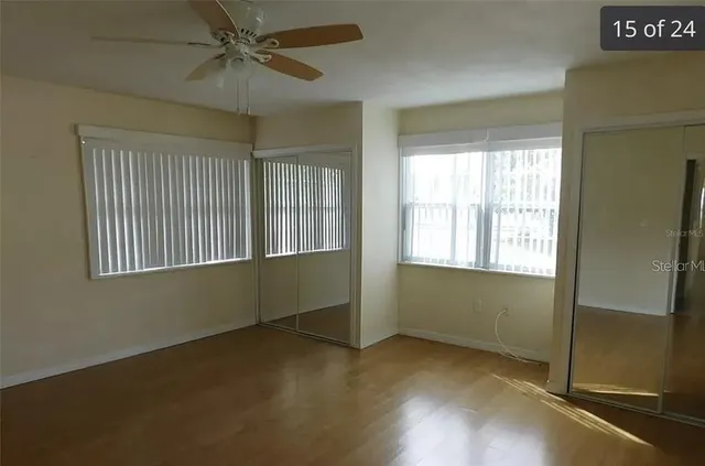 a view of an empty room with a window
