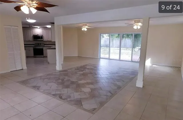 a view of a kitchen with a stove cabinets and a kitchen