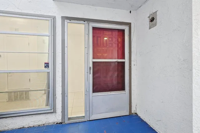 a view of front door with hallway