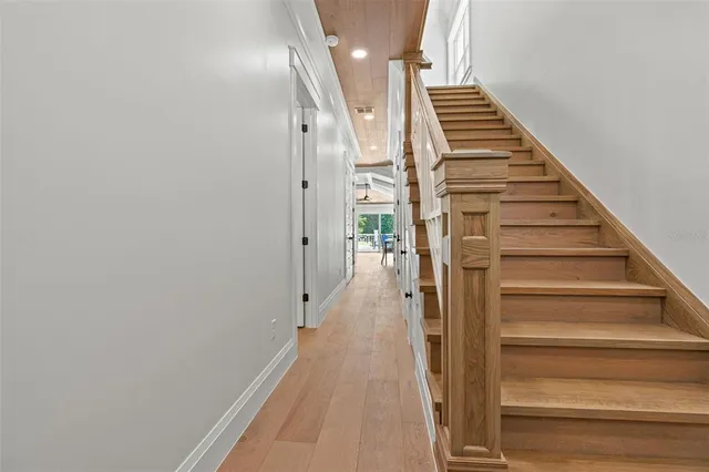 a bathroom with double sink and a mirror
