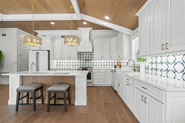 a bathroom with a sink a vanity and a mirror