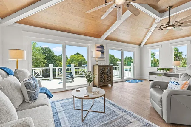 a view of a livingroom with furniture and a garage