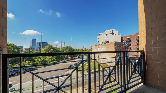 a view of a balcony with chairs