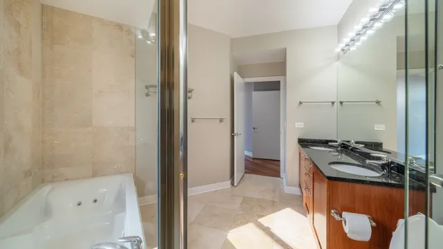 a kitchen with a refrigerator and a stove