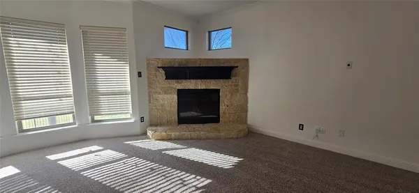 a view of a livingroom with a fireplace
