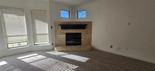 a view of a livingroom with a fireplace