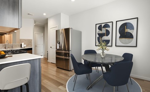 21319 Indigo Ruth Drive Spring, TX 77379 - Photo 21 of 34 a view of a dining room with furniture and wooden floor