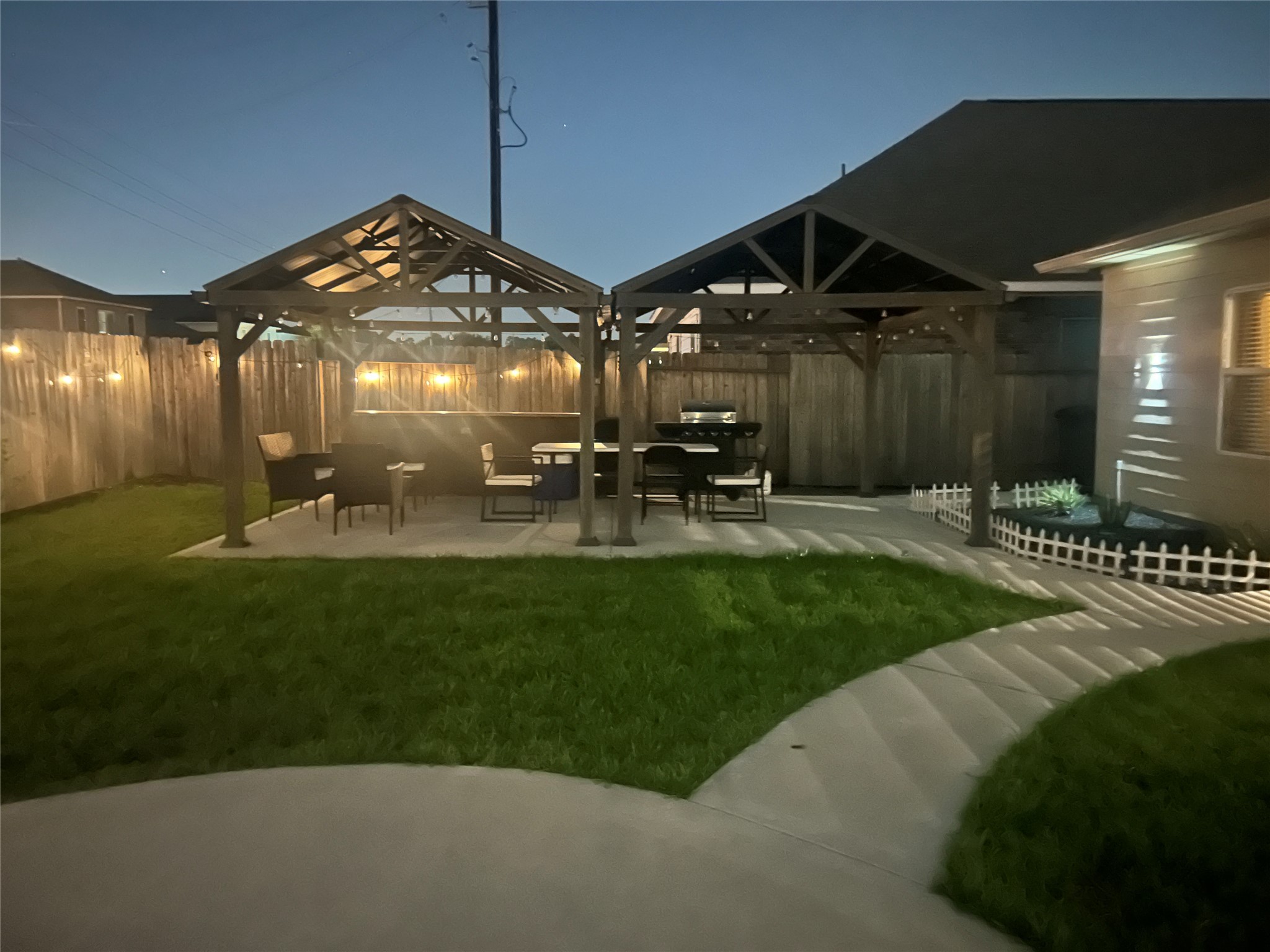 21319 Indigo Ruth Drive Spring, TX 77379 - Photo 30 of 34 a view of a house with a yard