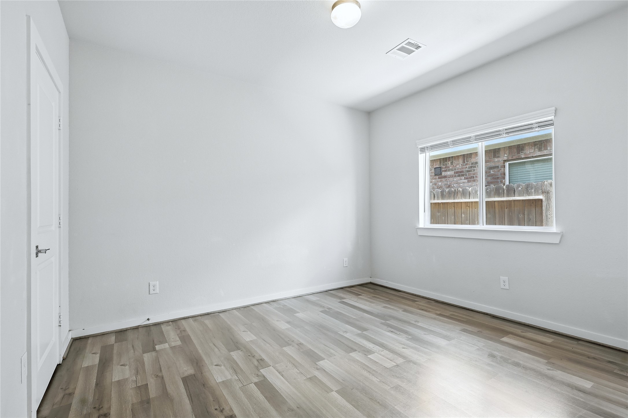 21319 Indigo Ruth Drive Spring, TX 77379 - Photo 7 of 34 an empty room with a window
