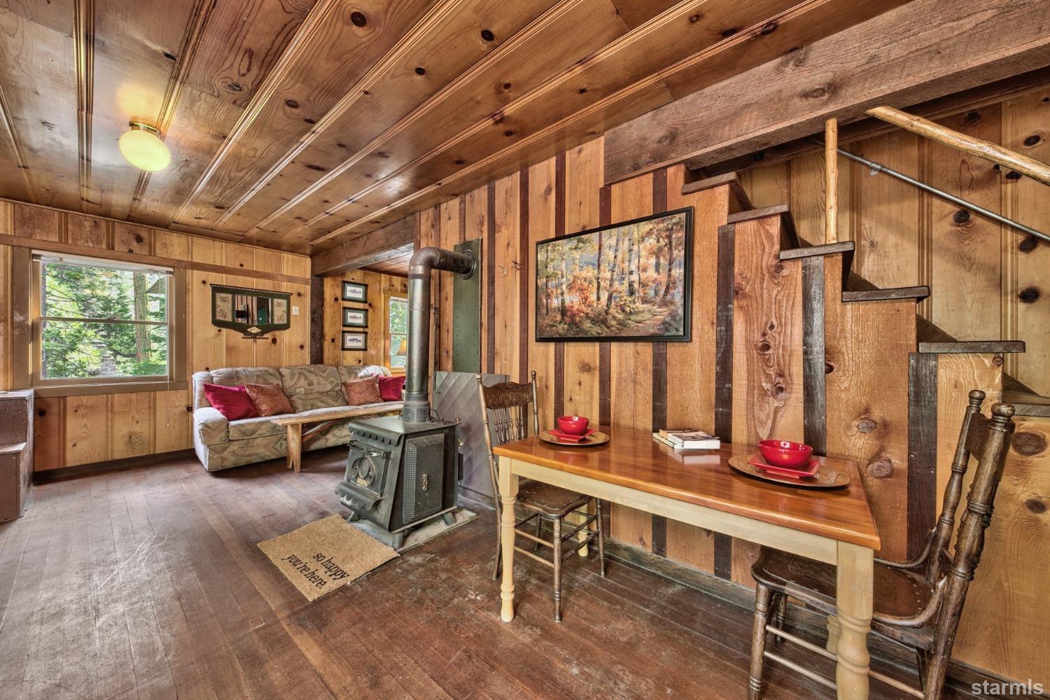 39 Milestone Road, Unit 32 Kyburz, CA 95720 - Photo 12 of 21 a living room with furniture and a window