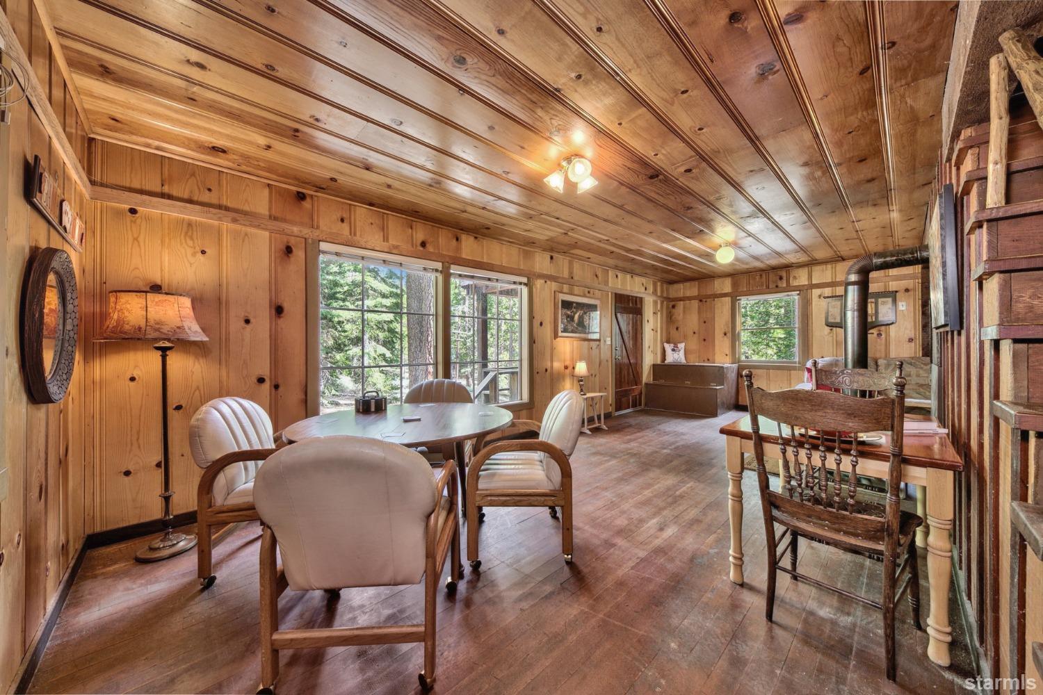 39 Milestone Road, Unit 32 Kyburz, CA 95720 - Photo 10 of 21 a view of a dining room with furniture window and outside view