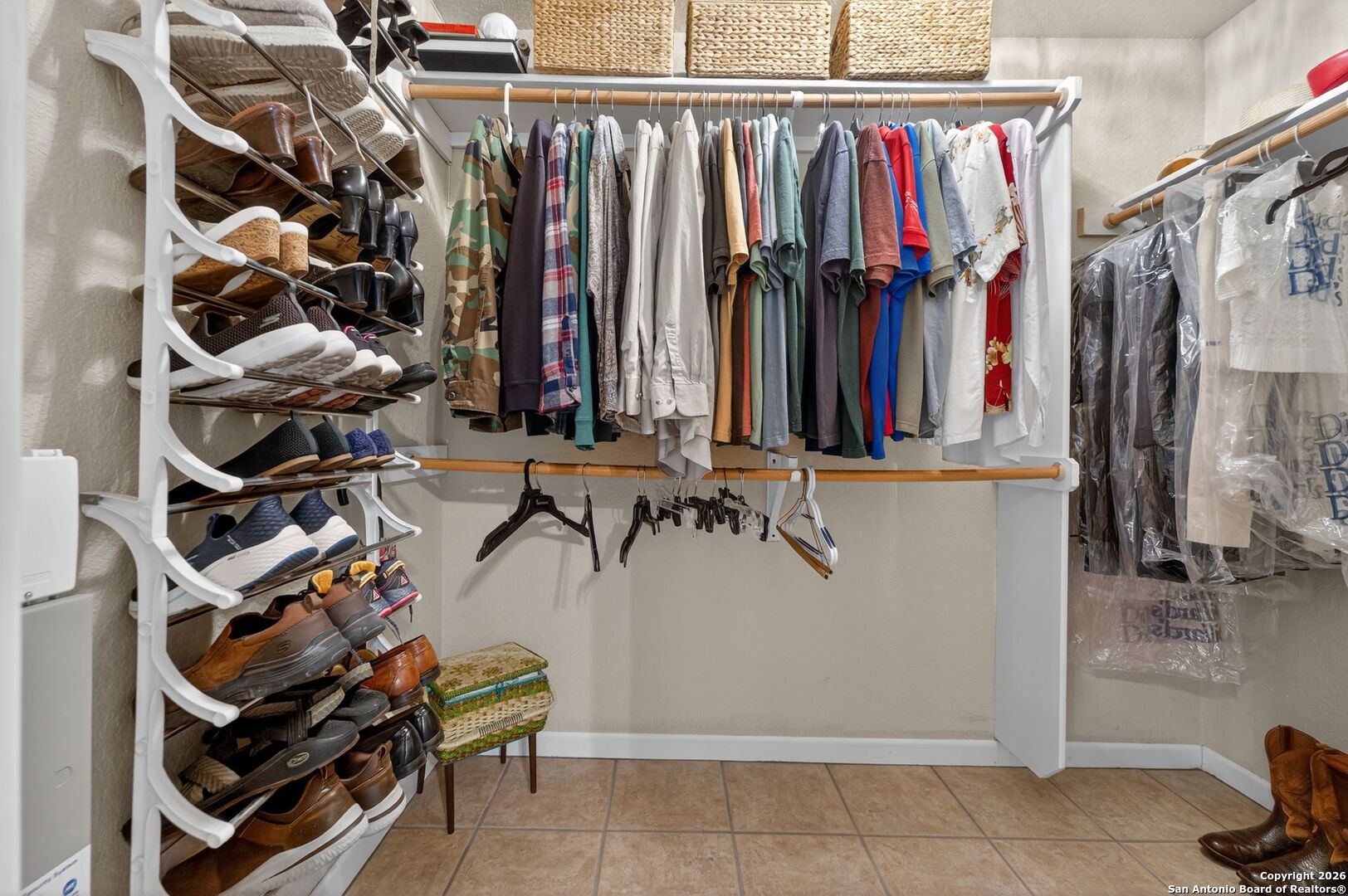 14802 Cross Xd Trail Helotes, TX 78023 - Photo 27 of 58 a view of walk in closet with clothes and shoes