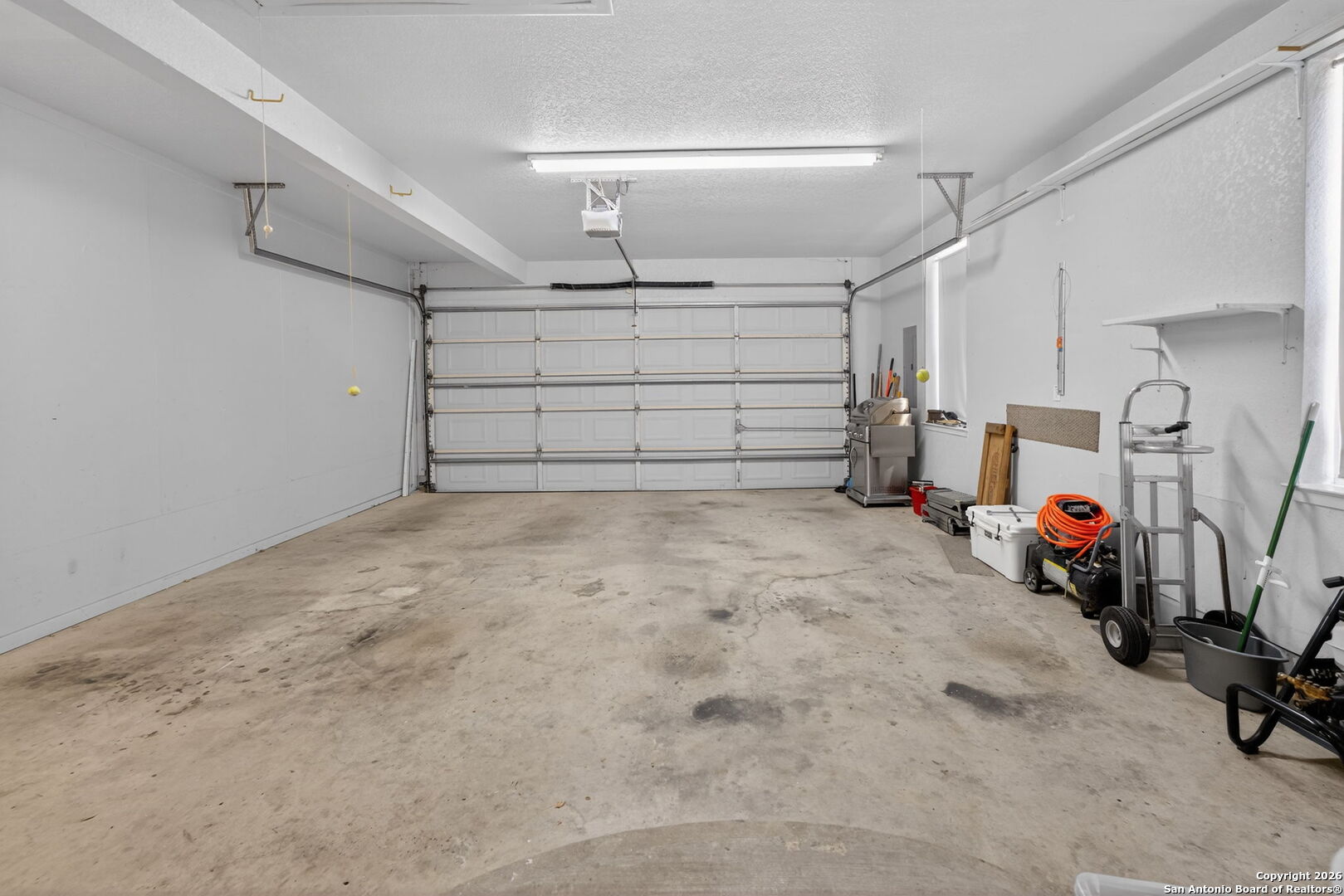 14802 Cross Xd Trail Helotes, TX 78023 - Photo 47 of 58 a view of a garage