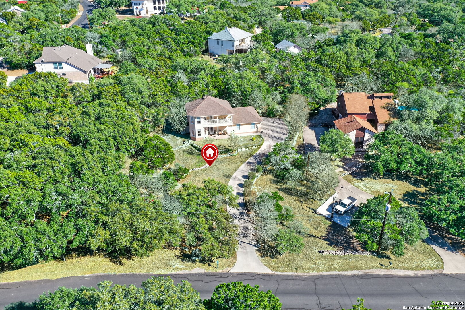14802 Cross Xd Trail Helotes, TX 78023 - Photo 56 of 58 an aerial view of a house with a yard and garden