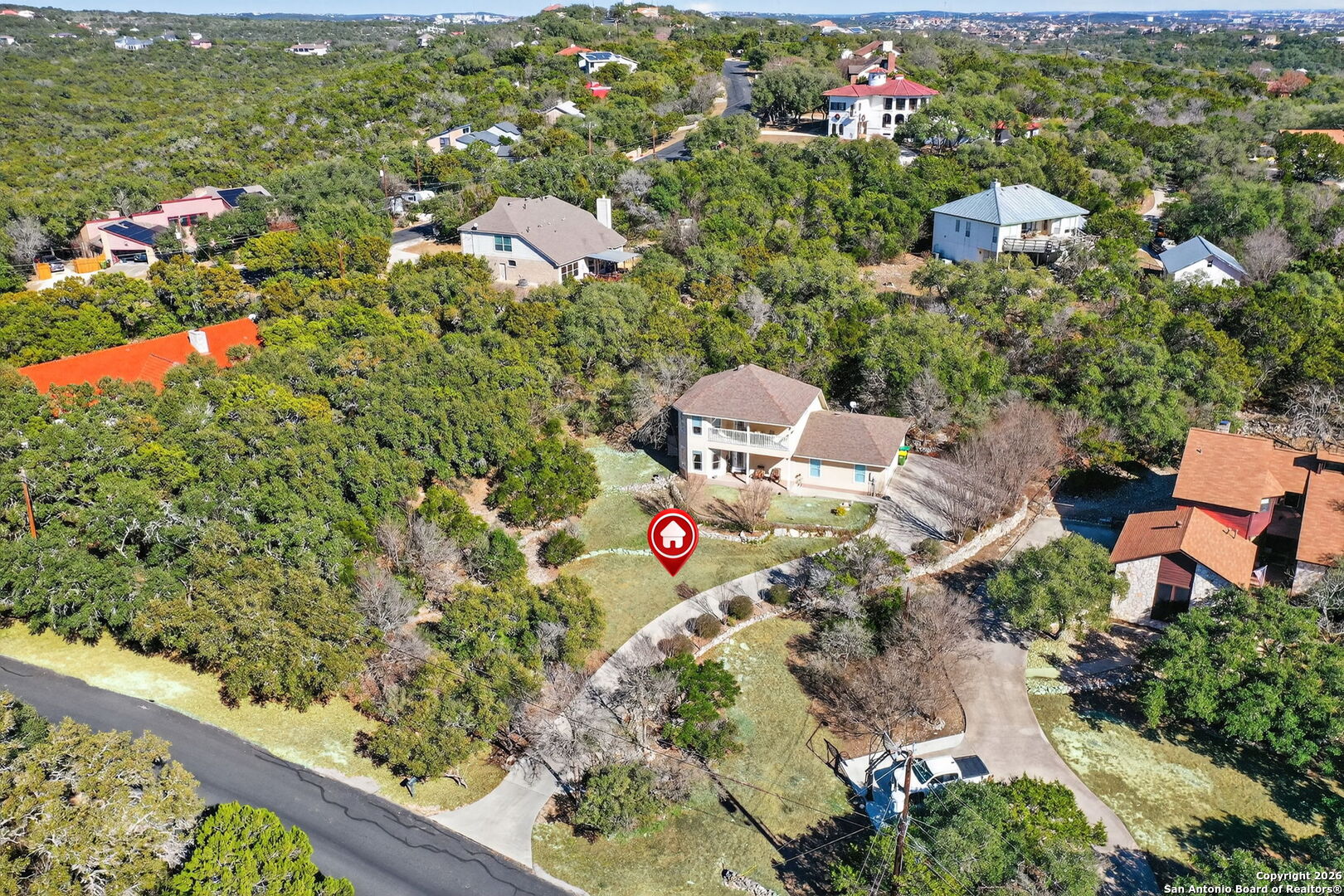 14802 Cross Xd Trail Helotes, TX 78023 - Photo 57 of 58 an aerial view of a house with a yard and lake view