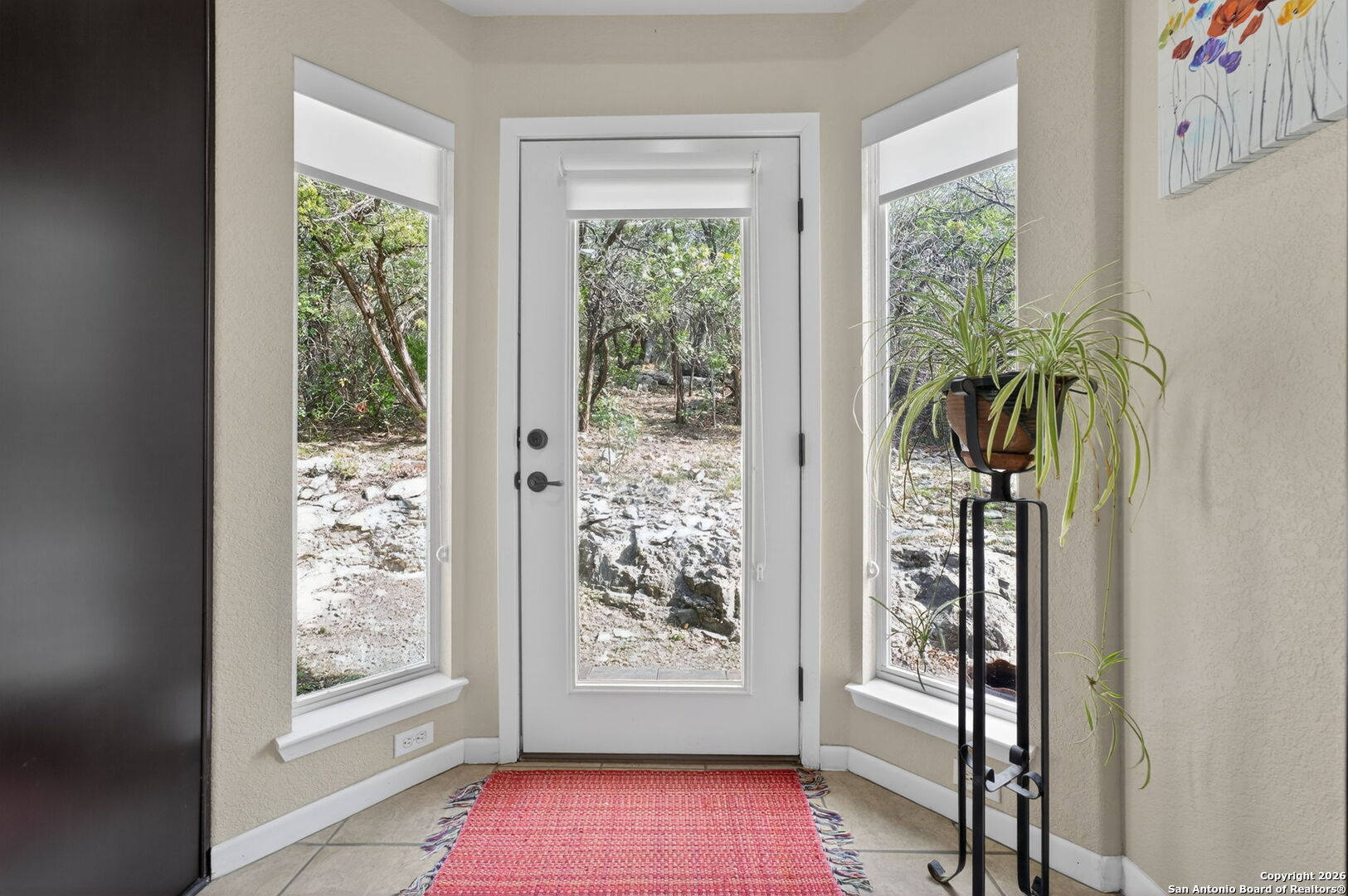 14802 Cross Xd Trail Helotes, TX 78023 - Photo 10 of 58 a view of entryway with wooden floor