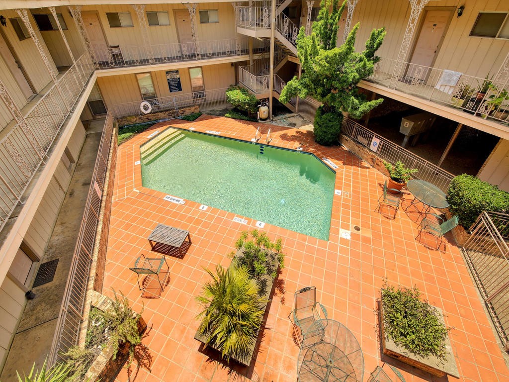 4553 Guadalupe Street, Unit 1BR Austin, TX 78751 - Photo 30 of 31 a view of swimming pool with a yard