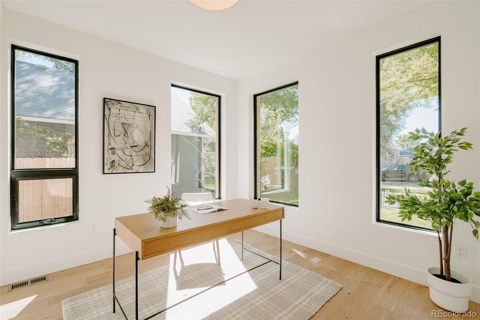 2530 Chase Edgewater, CO 80214 - Photo 19 of 37 a view of a livingroom with furniture and a potted plant