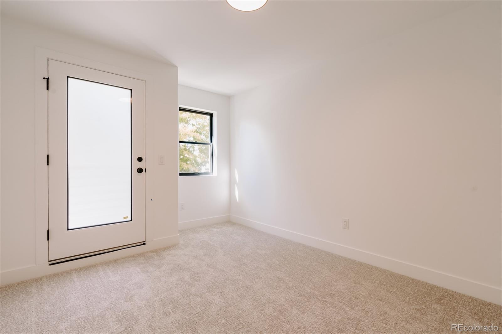 2530 Chase Edgewater, CO 80214 - Photo 29 of 37 an empty room with windows