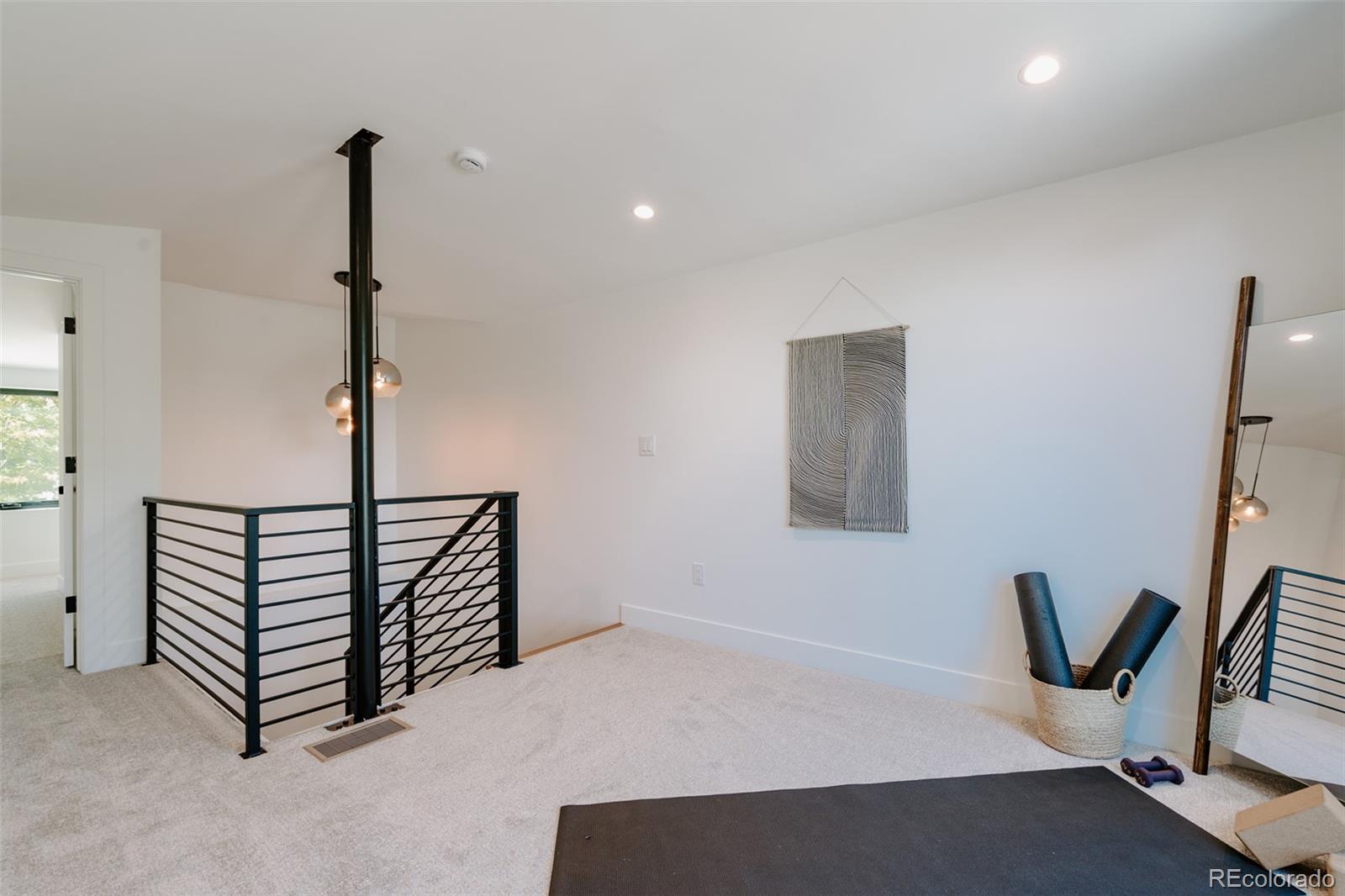 2530 Chase Edgewater, CO 80214 - Photo 33 of 37 a view of a room with gym equipment