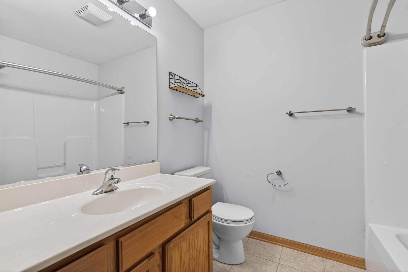 550 Madison Lane Elgin, IL 60123 - Photo 25 of 33 a bathroom with a sink and a toilet