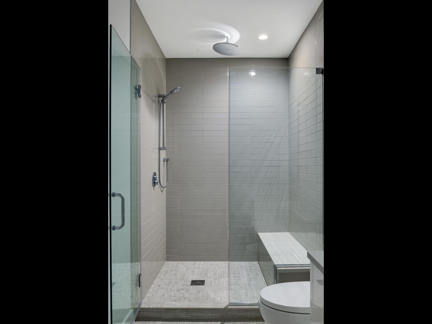 1701 West Webster Avenue, Unit 312 Chicago, IL 60614 - Photo 12 of 19 a bathroom with a toilet and a shower