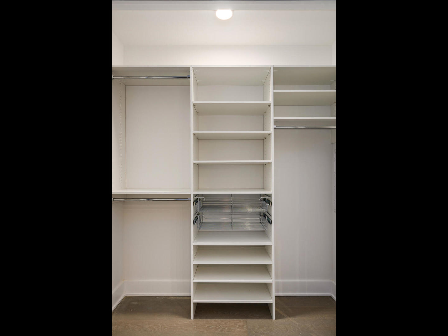 1701 West Webster Avenue, Unit 312 Chicago, IL 60614 - Photo 15 of 19 a view of walk in closet with empty racks