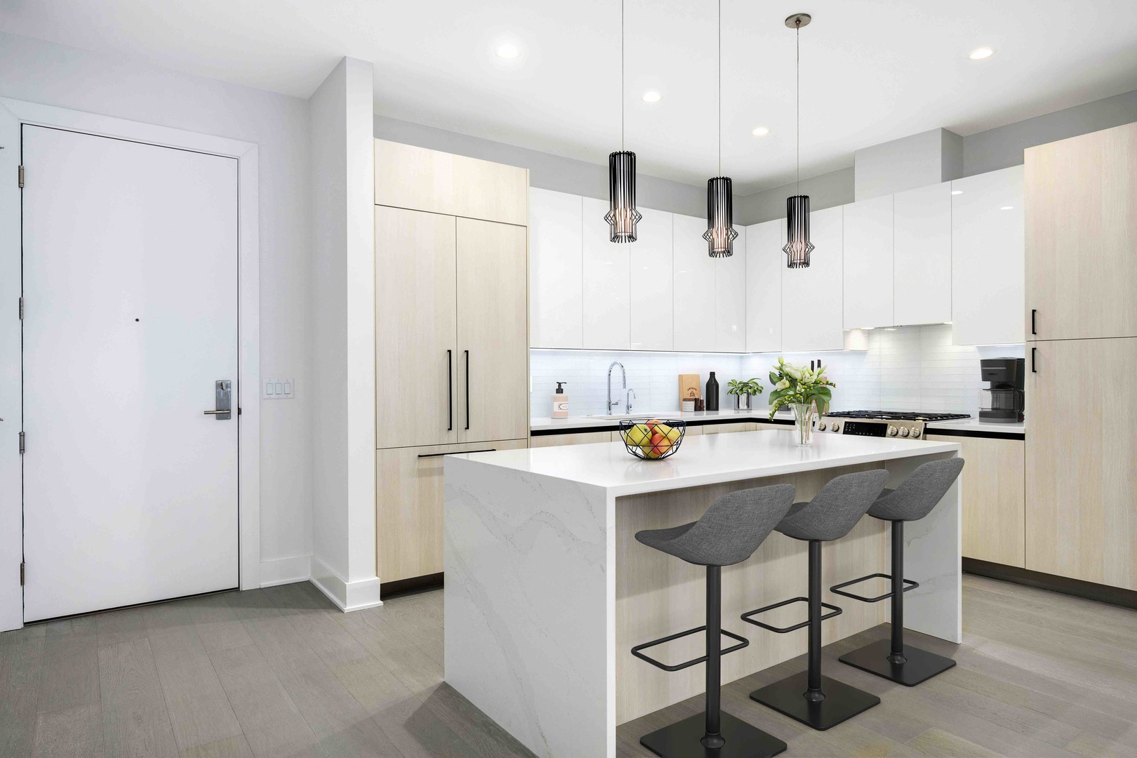 1701 West Webster Avenue, Unit 312 Chicago, IL 60614 - Photo 6 of 19 a kitchen with a sink a refrigerator and white cabinets