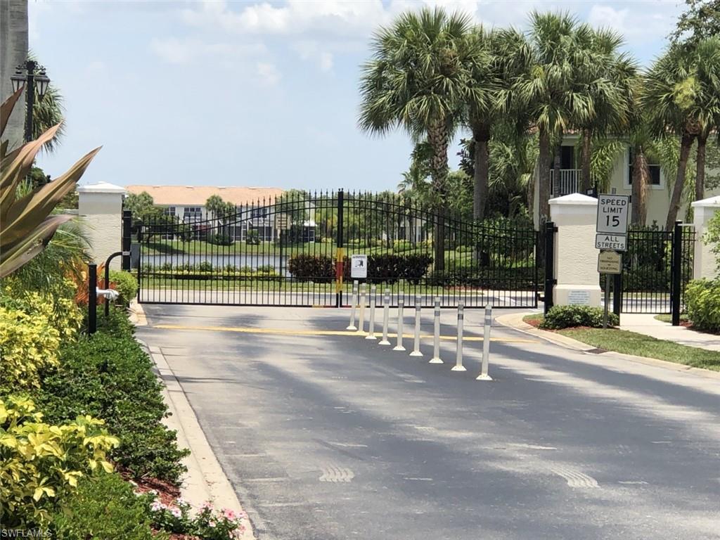1380 Tiffany Lane, Unit 2204 Naples, FL 34105 - Photo 27 of 29 a view of a street with houses