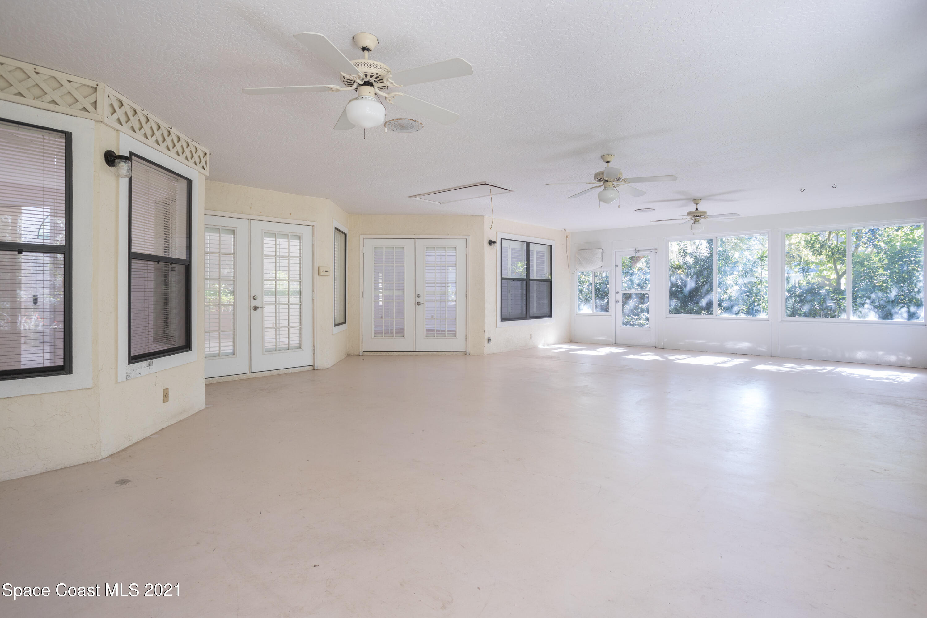 3930 Hammock Road Mims, FL 32754 - Photo 20 of 28 a view of an empty room with a window