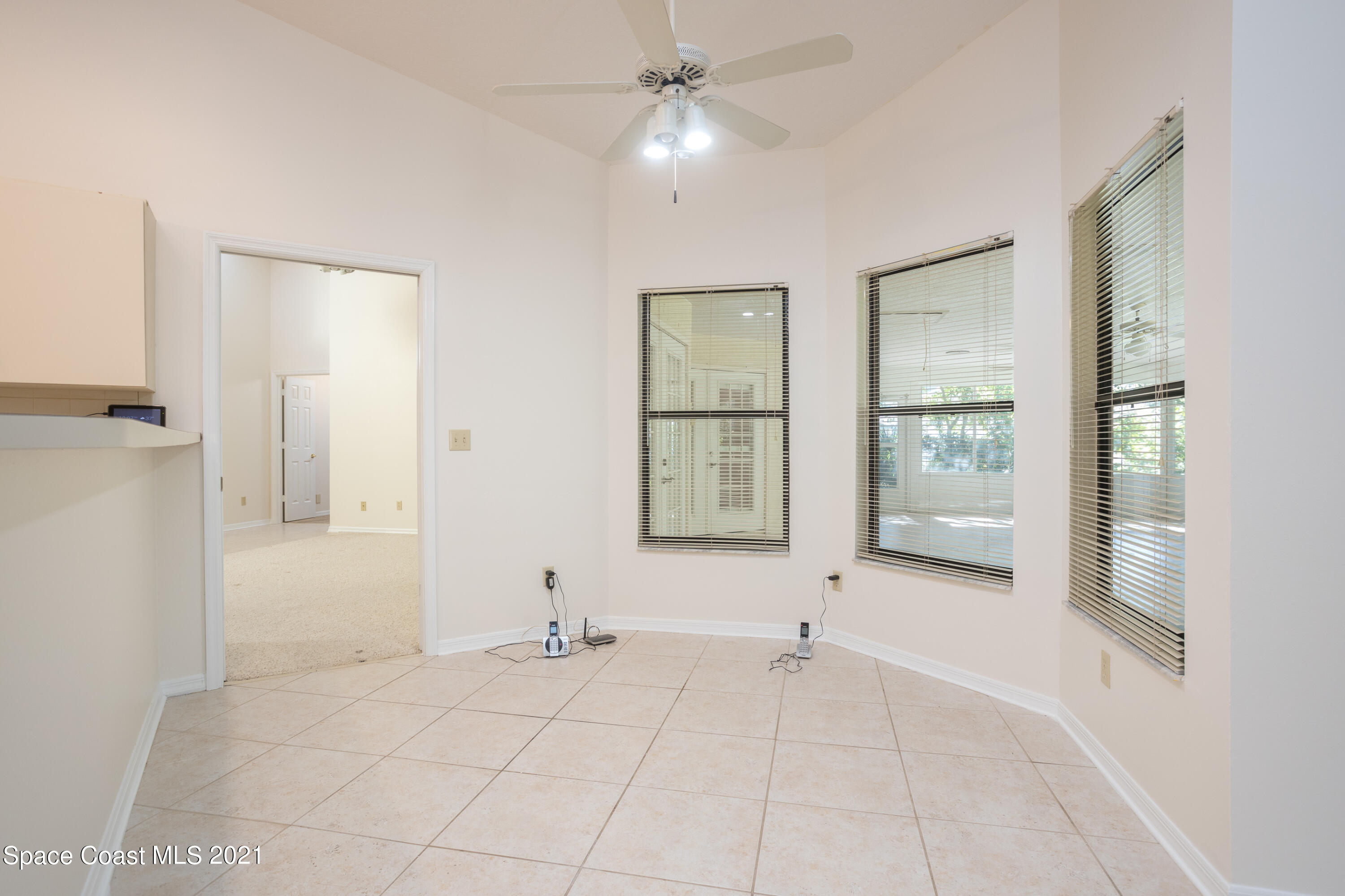 3930 Hammock Road Mims, FL 32754 - Photo 8 of 28 a view of an empty room with a window