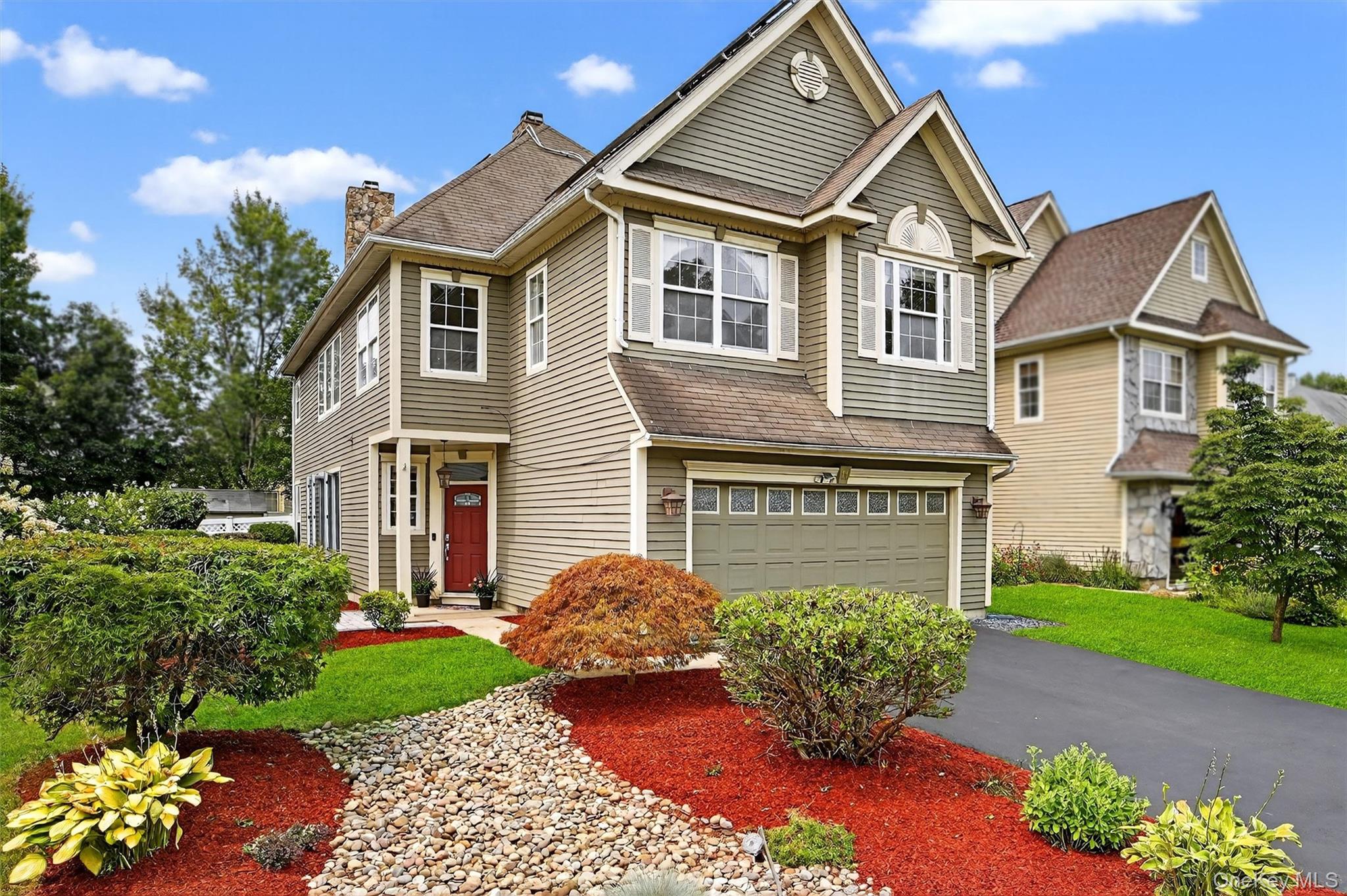 11 Scofield Court Peekskill, NY 10566 - Photo 1 of 1 a front view of a house with a yard
