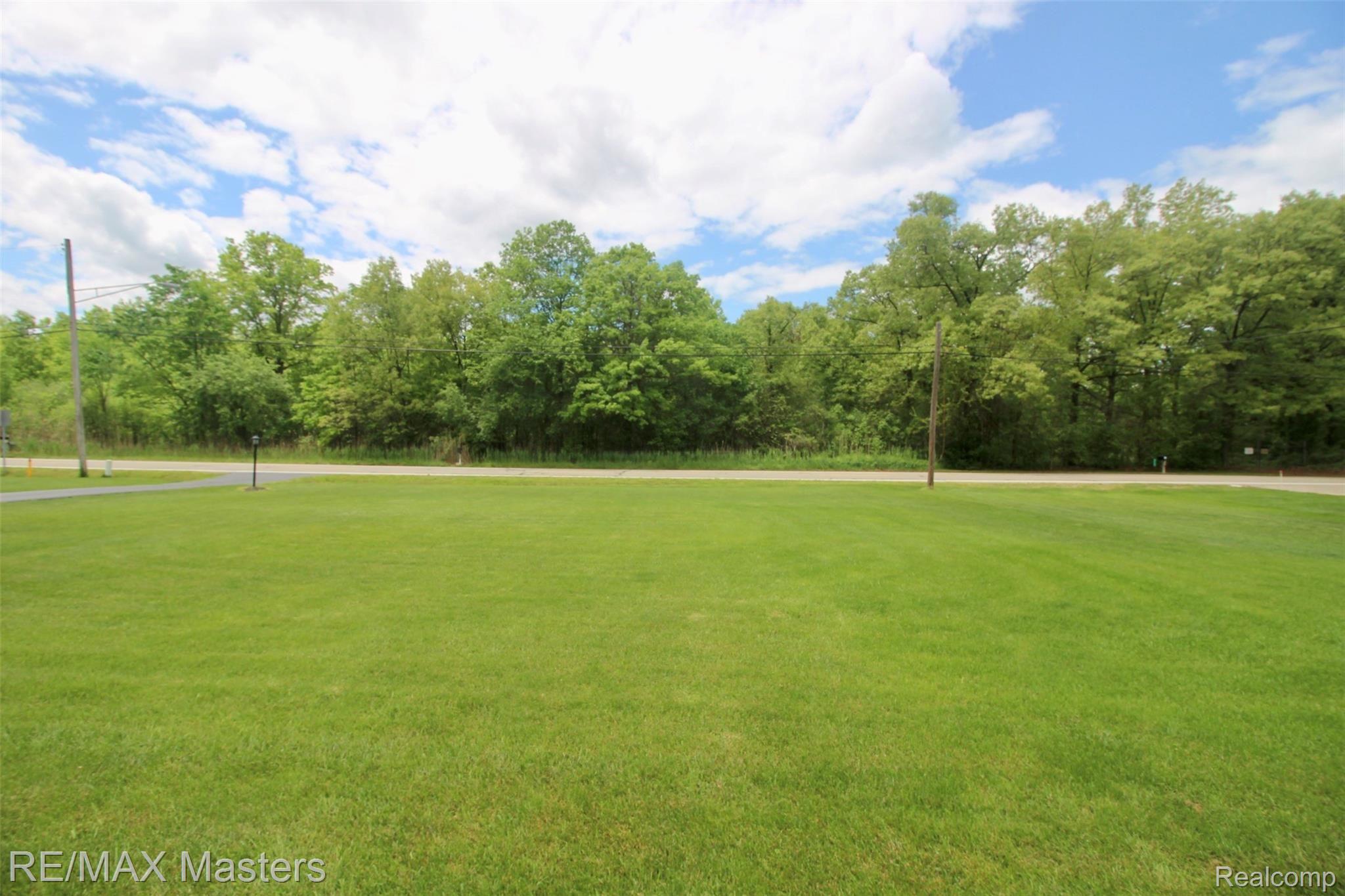25777 Inkster Road Flat Rock, MI 48134 - Photo 48 of 52 The house sits off the road a good distance, allowing for privacy, and another great view from the front window too!