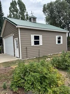 a backyard of a house with lots of green space