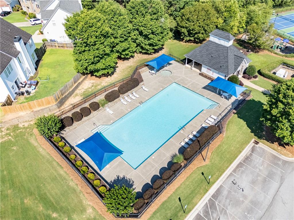 665 Roxford Lane Northeast Buford, GA 30518 - Photo 17 of 19 an aerial view of a tennis ground and a large tree