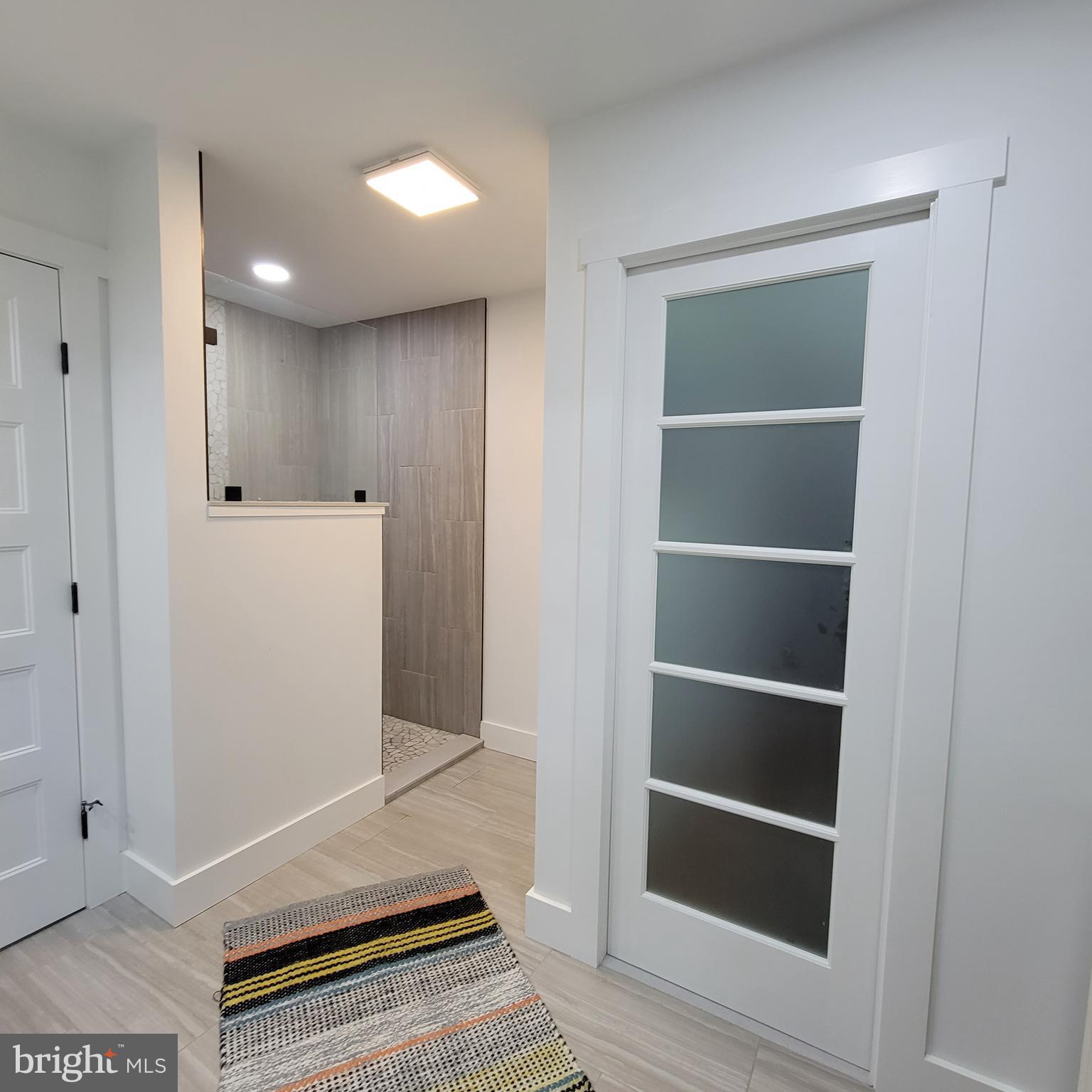 605 Marvel Road Milford, DE 19963 - Photo 56 of 105 Pocket door from closet to bath
