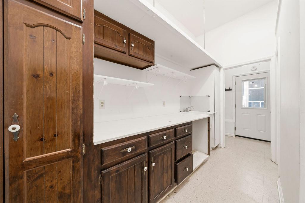 483 Allgood Road Flintstone, GA 30725 - Photo 25 of 34 a kitchen with a refrigerator and cabinets